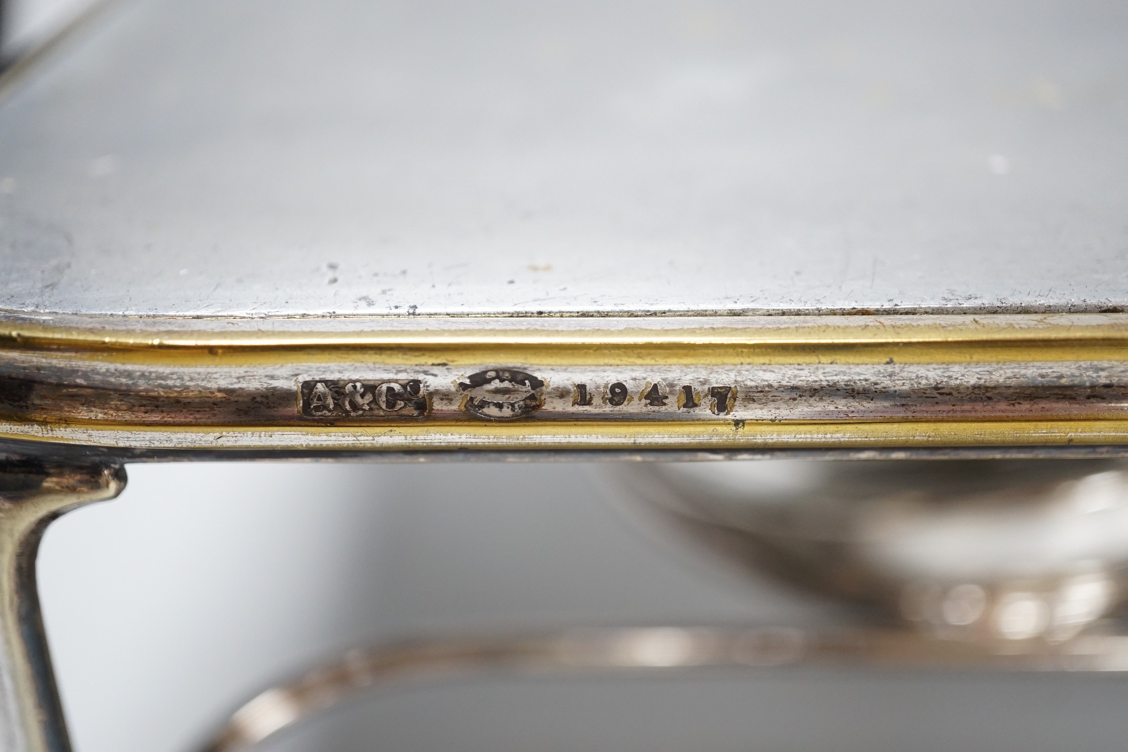 An Asprey spirit burner stand, serial number 19417, 47cm long
